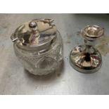 Silver lidded buiscuit jar and silver candlestick