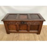 18th century carved oak coffer with panelled decoration on plank feet