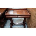 Early Victorian mahogany library table/writing table with ledge back and two moulded frieze drawers