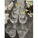 Set of fine quality cut glass with foliate engraved ornament