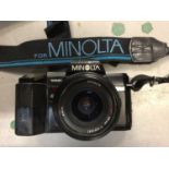 Pair of binoculars, Sony camcorder, Minolta camera with zoom lens, and similar items