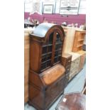Good quality Georgian style walnut dome top bureau bookcase, with shelves above enclosed by two glaz