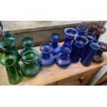 Collection of coloured glass hyacinth vases