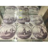 Six 18th century Delft manganese tiles with painted windmill and landscape decoration