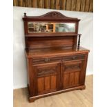 Late Victorian walnut two height sideboard with raised bevelled mirror back, two drawers and two car