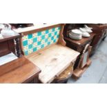 Old pine washstand with tiled back and drawer below on turned legs