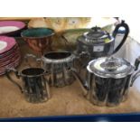 Victorian silver plated three peice teaset, another teapot and a brass chalice, possibly trench art