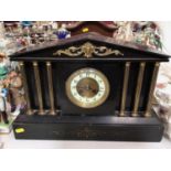 Early 20th century black slate mantel clock, together with two mantel clocks with presentation plaqu