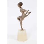 Art Deco silvered bronze figure of a nude woman dancing, on an onyx base, 18cm high