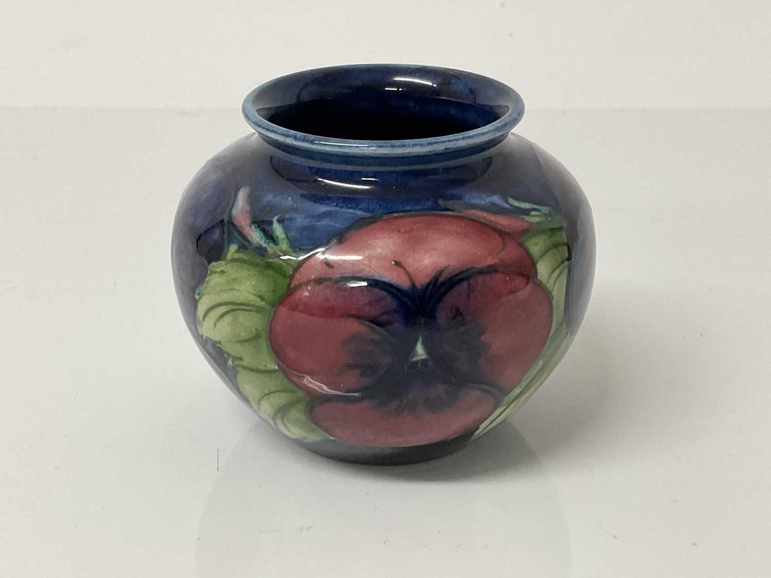 Moorcroft pottery vase decorated in the pansy pattern, impressed marks to base, 7cm high