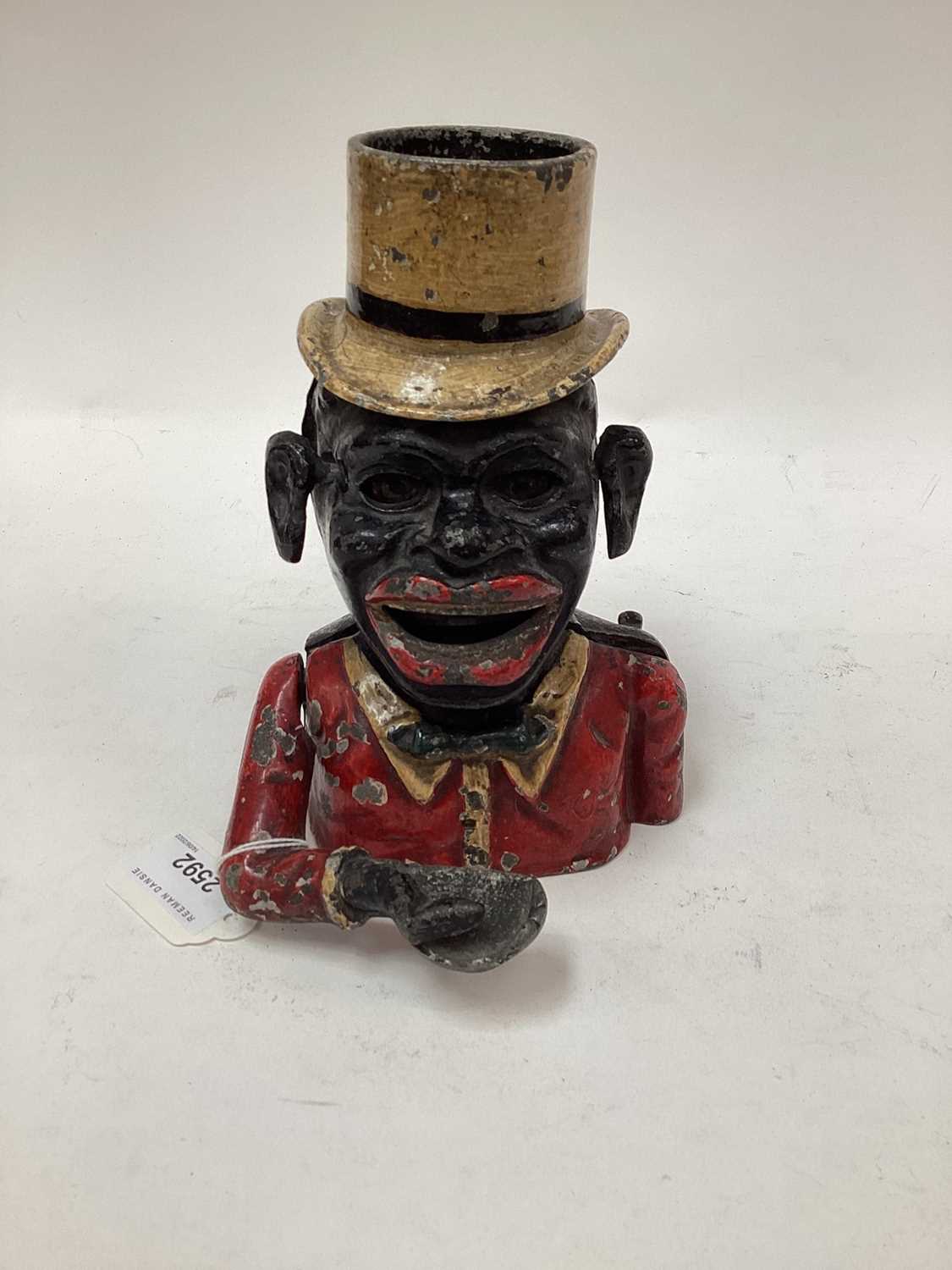 1920s/30s Starkie’s cast alloy “Gentleman with Top Hat” mechanical money box, with moveable arm, ton