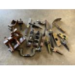 Antique plane by Norris of London, together with another similar and various antique tools