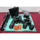 Canon EOS 1100d with lenses, together with other camera equipment and binoculars
