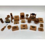 Group of Mauchline ware, including boxes, pocket watch holder, egg timer, money boxes, etc