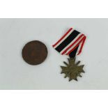 Second World War Nazi War Merit Cross (with swords) together with a Japanese bronze medallion