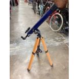 Astral 400 telescope on tripod stand