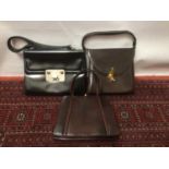 Waldybag handbag selection, three in Waldybag boxes, black leather with chrome fastening, brown liz