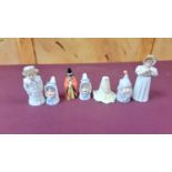 Fourteen Royal Worcester candle snuffers including Welsh lady