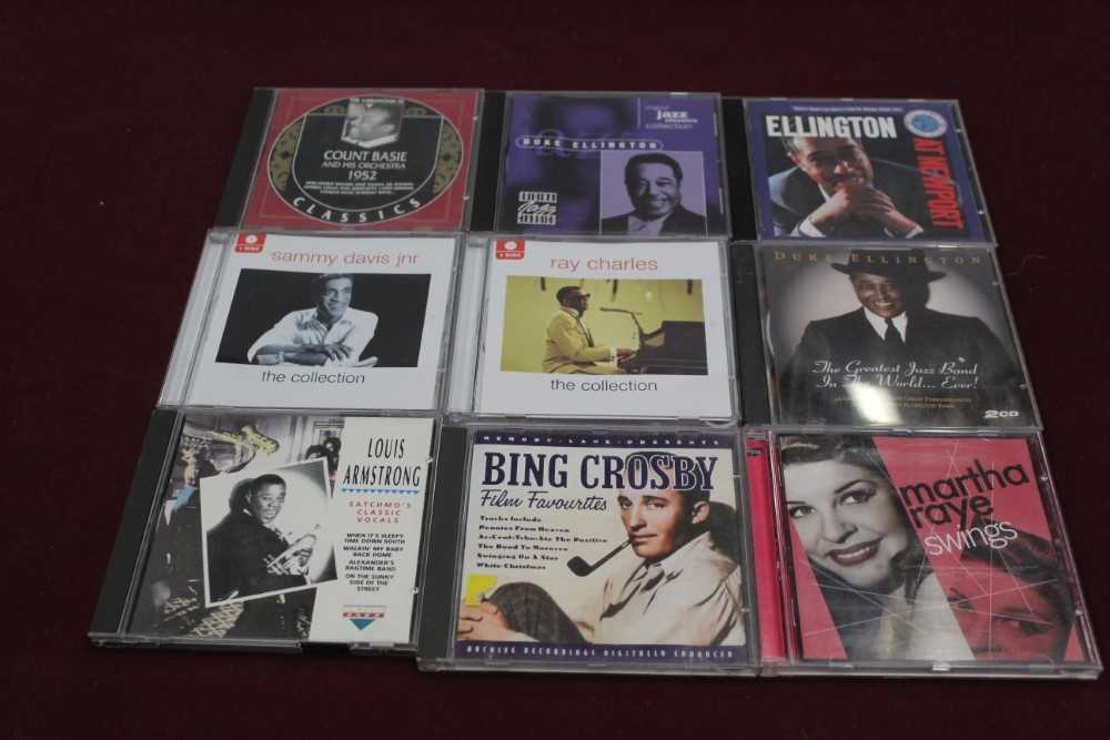 Two boxes of Jazz CDs and cassettes, including Duke Ellington and Louis Armstrong