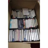 Three boxes of cassettes totalling over 200 and including original and home recordings. Artists incl