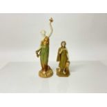 Two Royal Worcester figures - lady holding a dove and lady with bag, tallest is 26cm high, the other