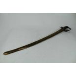 Indian military sword with ribbed wooden grip, brass stirrup hilt with curved polished steel blade,