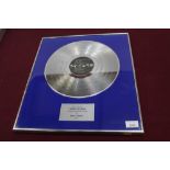 Barry White framed platinum record, presented to nightclub owner Chris George
