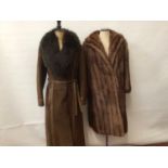 Vintage musquash fur coat, 1970's brown suede and leather coat and a fur wrap.