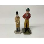 Two Royal Worcester male figures, both wearing hats, tallest is 17.5cm high, the other is 15.5cm hig