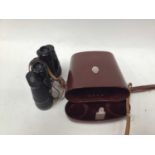 Pair of Carl Zeiss 10x50 W binoculars in original leather carry case