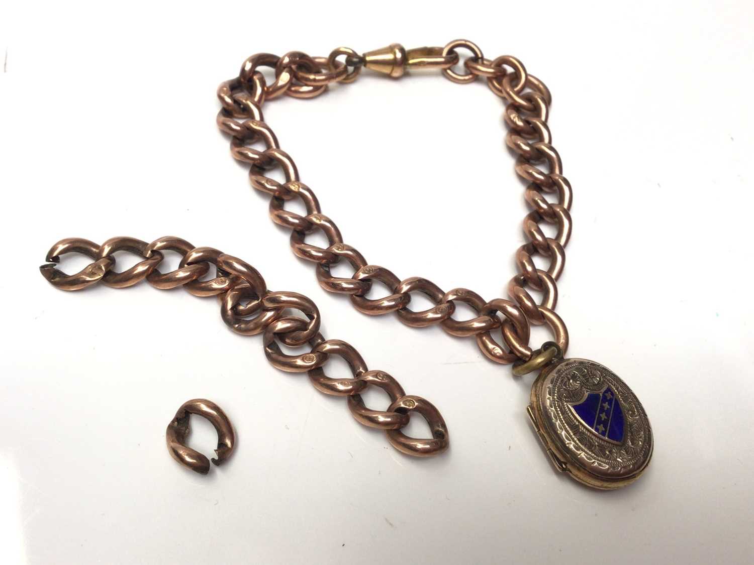 Victorian 9ct rose gold link chain with gilt metal enamelled locket fob