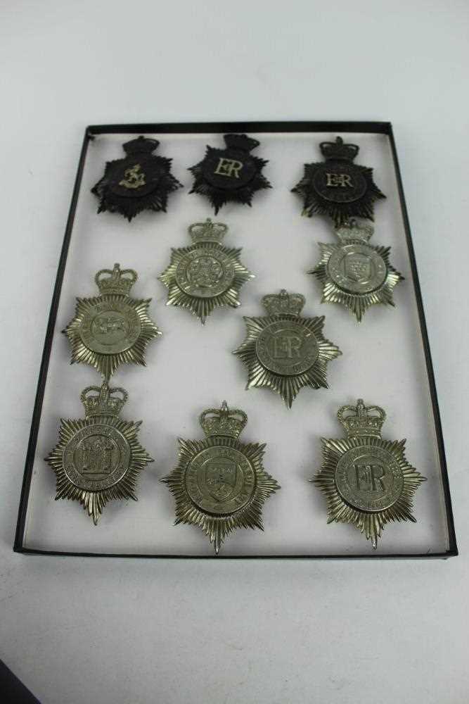 Three cases of Elizabeth II Police helmet plates and other badges to include Warwickshire, Dorset an - Image 2 of 3