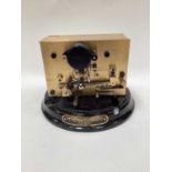 Rare early 20th century ticker tape machine by The Exchange Telegraph Co. Ltd. Number 1426, on circu