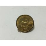 South Africa - Gold Krugerrand 1974 GEF set in 9ct gold ring mount (Total wt. 36.9gms)