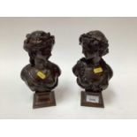 A pair of patinated bronze busts, each depicting a classical lady on a socle, one signed 'Marin', th