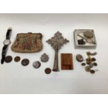 Collection of military badges, map measure, enamel box, cross, buttons and sundries.