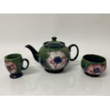 Moorcroft pottery poppy pattern teapot with sugar bowl and milk jug