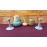 Group of Ruskin pottery to include a pair of lustre glazed candlesticks (5)