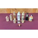 Royal Worcester dog's head whistle, together with nine Royal Worcester candle snuffers including Owl