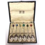 Set six Liberty & Co coffee spoons with terminals mounted with semi precious stones, in fitted case