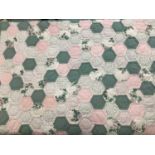 Patchwork Hand and machine made green and floral hexagon quilt with makers name and date 1988, simil