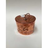 Newlyn copper tea caddy, the pull-off cover with loop handle, the body relief decorated with galleon