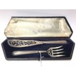 Pair of Victorian silver fish servers with pierced and engraved decoration, (Sheffield 1856), in fit