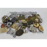 Collection of British military brass belt buckles together with American and other belt buckles (1 b