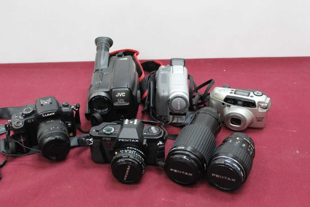 Collection of cameras and accessories