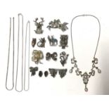 Group silver marcasite jewellery, silver brooches and chains