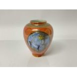 Carlton ware lustre vase decorated with figures on orange ground, 13cm high