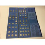 G.B. - Five Whitman folders containing mixed silver coinage to include Florins and Shillings with so