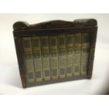 Miniature bookcase glazed, with complete works of Shakespeare published by Charles Tilt. C.1830