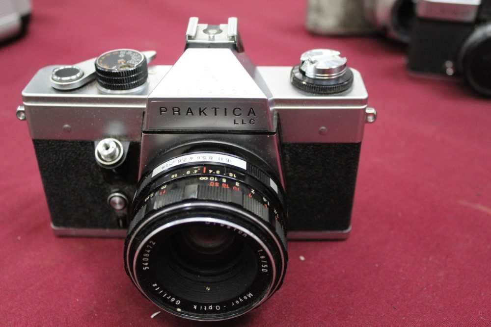 Group of cameras and lenses, including several Praktica, Kodak Retinas, Bolex cine camera, etc - Image 2 of 26